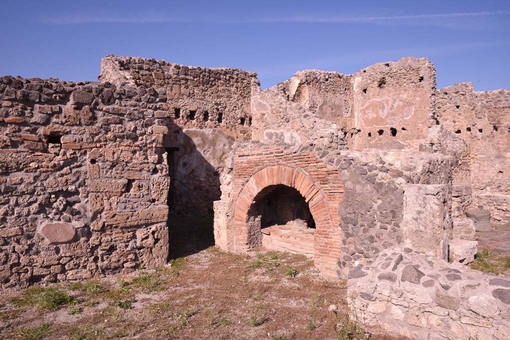 I.4.13 Pompeii. October 2019. Room a, looking north-east across bakery room towards doorway, in shadow, to room b.
Foto Tobias Busen, ERC Grant 681269 D�COR.
