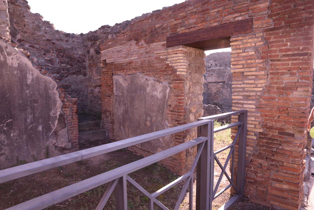 I.4.14 Pompeii. October 2019. Looking towards south wall, with doorway into I.4.13.
Foto Tobias Busen, ERC Grant 681269 D�COR.
