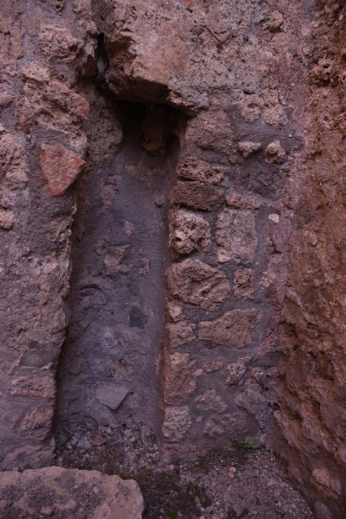I.4.18 Pompeii. October 2019. 
North-east corner of rear room, detail of site of downpipe from an upper floor room ?
Foto Tobias Busen, ERC Grant 681269 D�COR.
