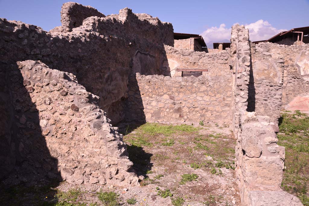 I.4.22 Pompeii. October 2019. North wall of room �e�, looking through doorway into room �d�.
Foto Tobias Busen, ERC Grant 681269 D�COR.

