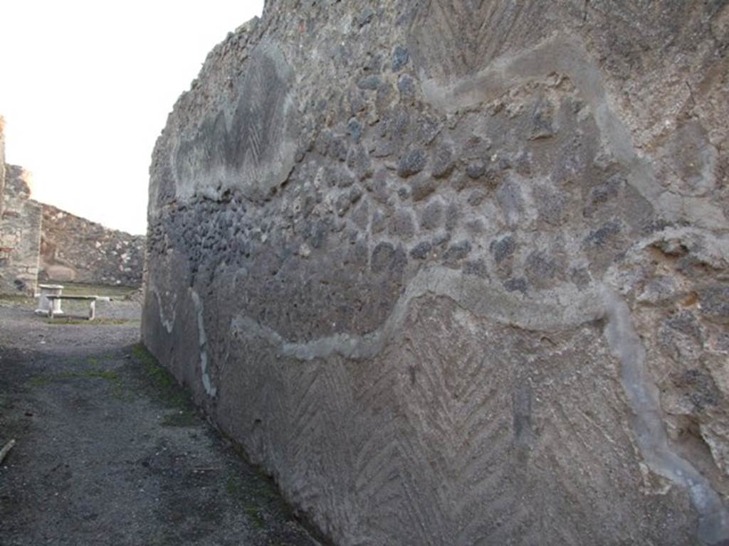 I.4.22 Pompeii. December 2007. West wall of fauces, with layer of preparation plaster for better adhesion of the final coat..
