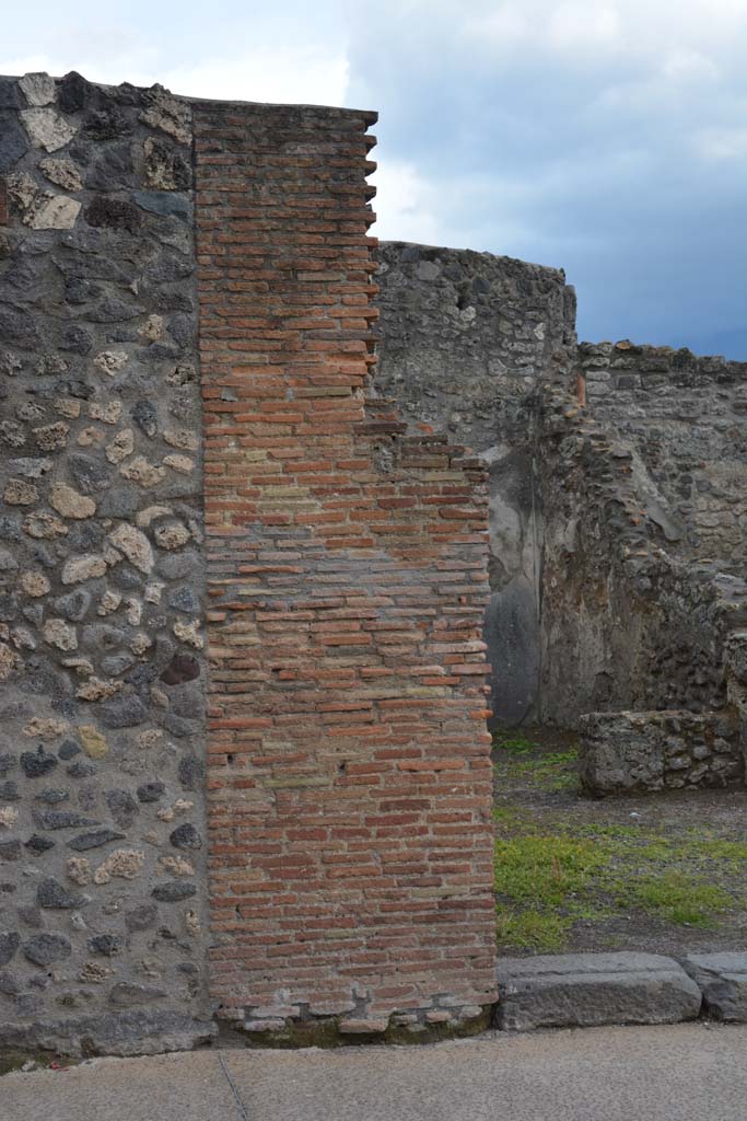 I.4.24 Pompeii, May 2019. 
Looking south to detail of masonry pilaster at east end of entrance doorway.
Foto Tobias Busen, ERC Grant 681269 D�COR.
