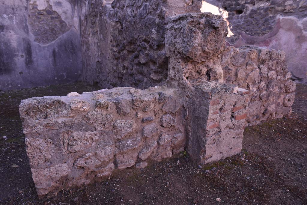 I.4.24 Pompeii. October 2019. 
Looking south to west side of dividing wall between shop and rear room, with I.4.23, on right.
Foto Tobias Busen, ERC Grant 681269 D�COR.
