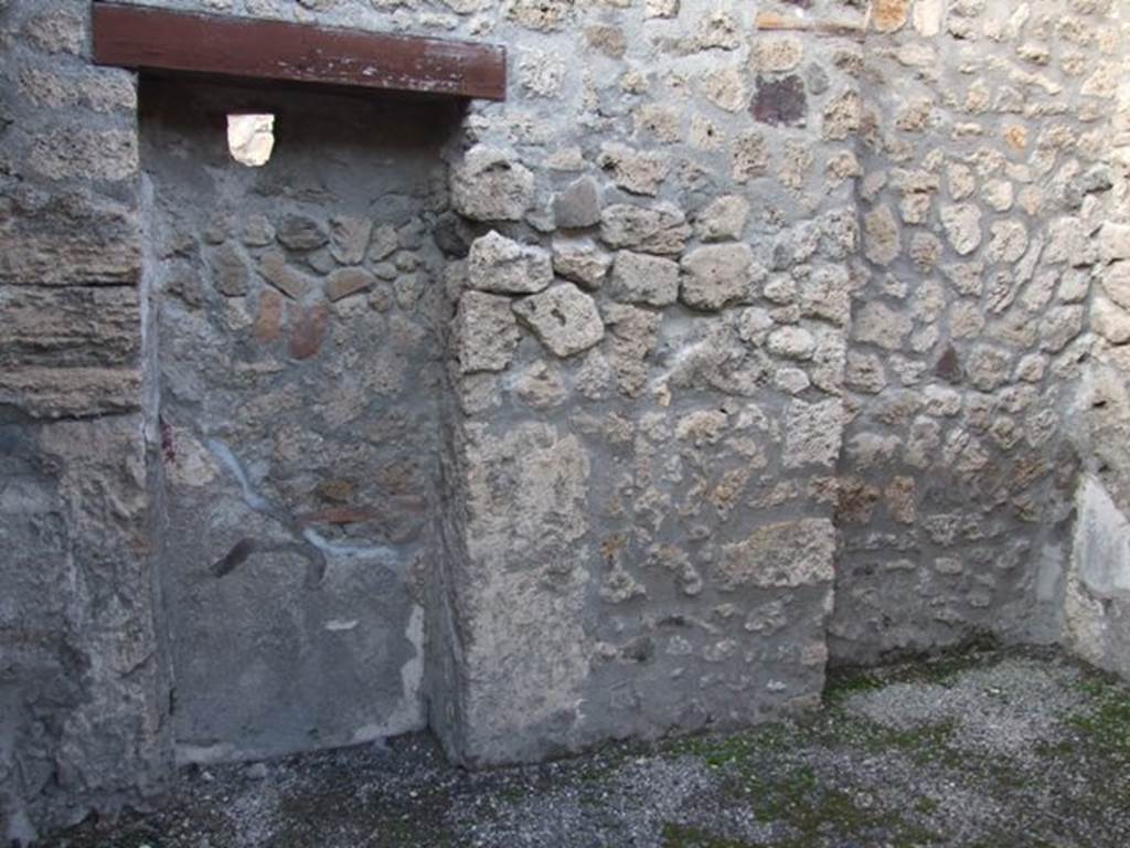 I.4.25/1.4.5 Pompeii. December 2007. Room 10, blocked doorway in north wall of cubiculum on north side of atrium.