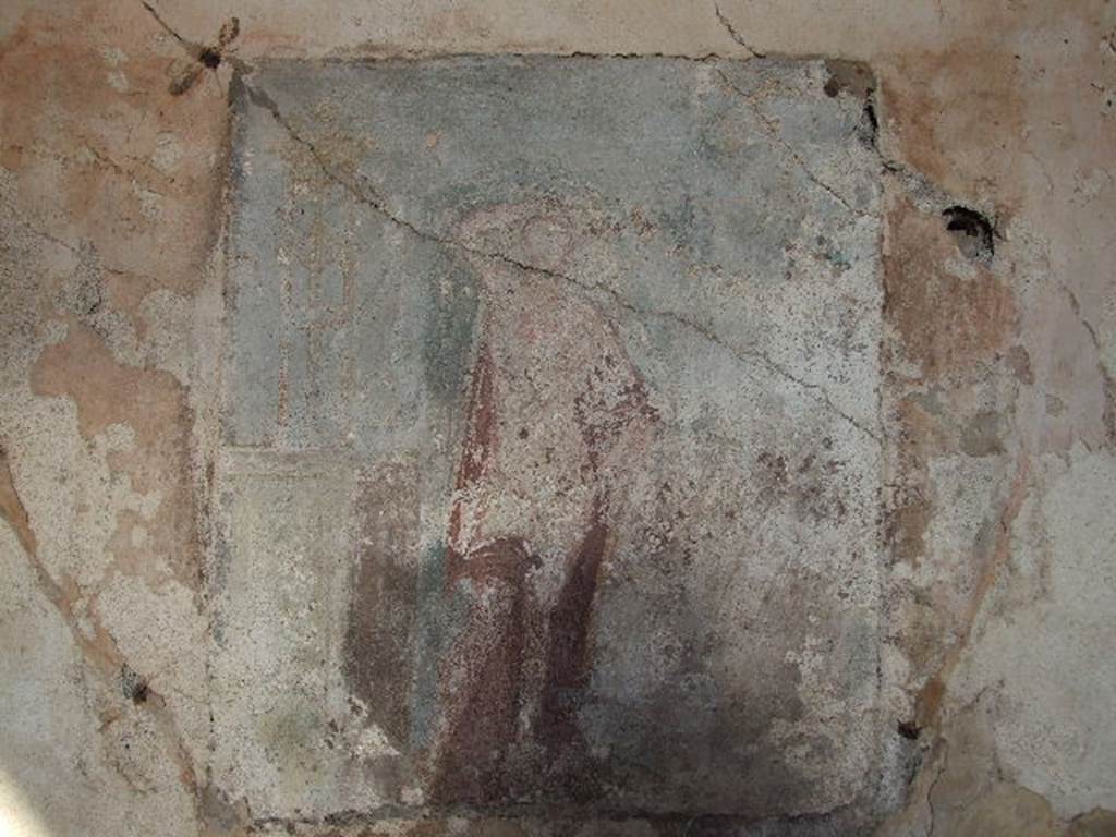 I.4.25 Pompeii. December 2006. 
Room 23, east wall of cubiculum. Remains of a wall painting of Apollo with a plectrum in his right hand above his head. 
The lyre is in his other hand. A base nearby has a tripod on it. 
See Helbig, W., 1868. Wandgem�lde der vom Vesuv versch�tteten St�dte Campaniens. Leipzig: Breitkopf und H�rtel. (183, p.51).
