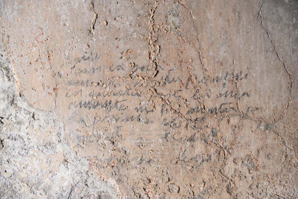 I.4.25/I.4.5 Pompeii. September 2020. Unnumbered corridor/room, detail of writing on east wall. 
Foto Tobias Busen, ERC Grant 681269 D�COR.


