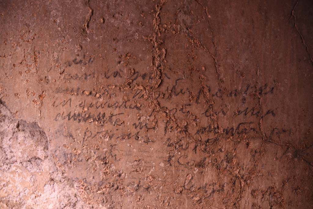 I.4.25/I.4.5 Pompeii. October 2019. Unnumbered corridor/room, detail of writing from east wall. 
Foto Tobias Busen, ERC Grant 681269 D�COR.



