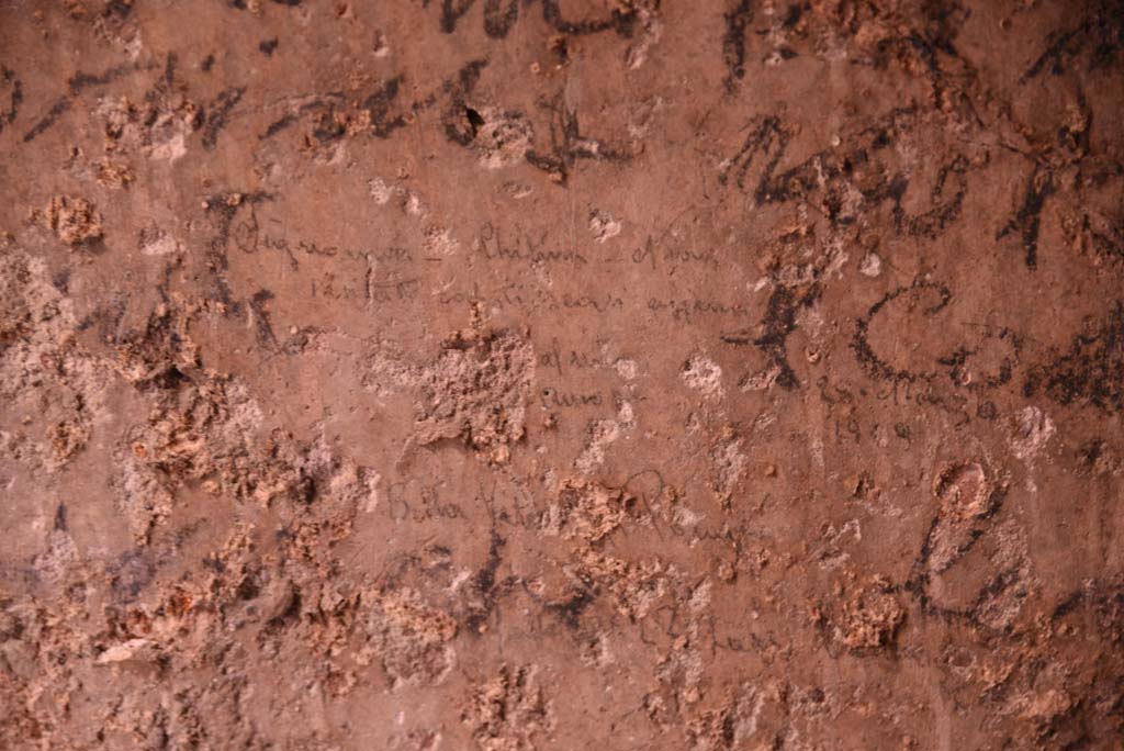 I.4.25/I.4.5 Pompeii. October 2019. Unnumbered corridor/room, detail of smaller writing from east wall. 
Foto Tobias Busen, ERC Grant 681269 D�COR.