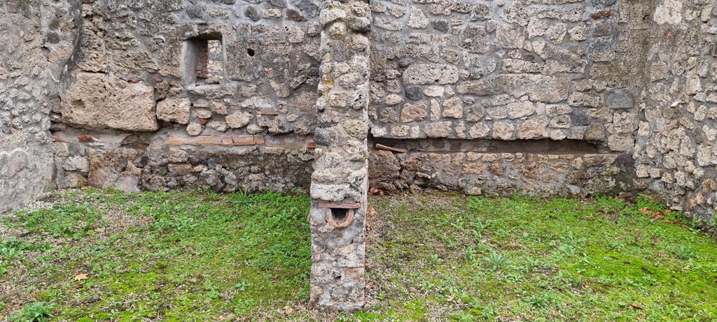 I.5.2 Pompeii. December 2023.
Looking east towards two of the compartments in the south-east corner of peristyle. Photo courtesy of Miriam Colomer.