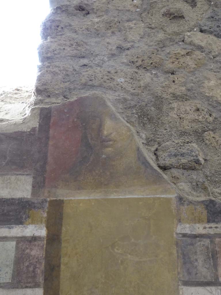 I.6.2 Pompeii. September 2017. 
Detail of painted face from upper east wall on south side of window at north end of cryptoporticus.
Foto Annette Haug, ERC Grant 681269 D�COR.
