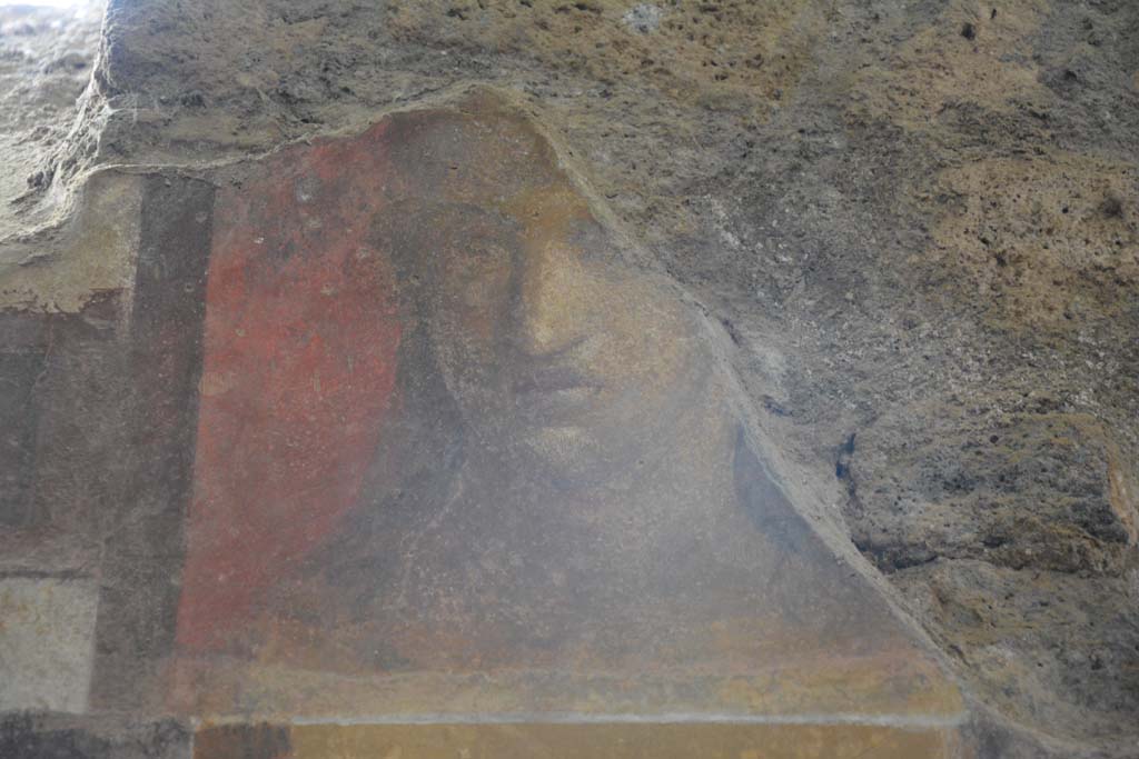 I.6.2 Pompeii. March 2019. Detail of painted face from upper east wall on south side of window at north end of cryptoporticus.
Foto Annette Haug, ERC Grant 681269 D�COR.
