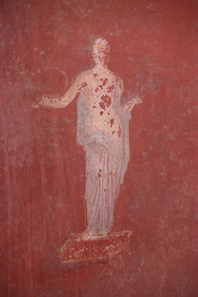 I.6.4 Pompeii. October 2024.
Room 5, detail of painted figure from east end of south wall. Photo courtesy of Klaus Heese.