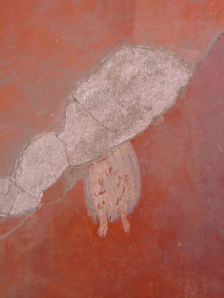 I.6.4 Pompeii. March 2009.
Room 5, remains of painted flying figure from west wall in south-west corner.