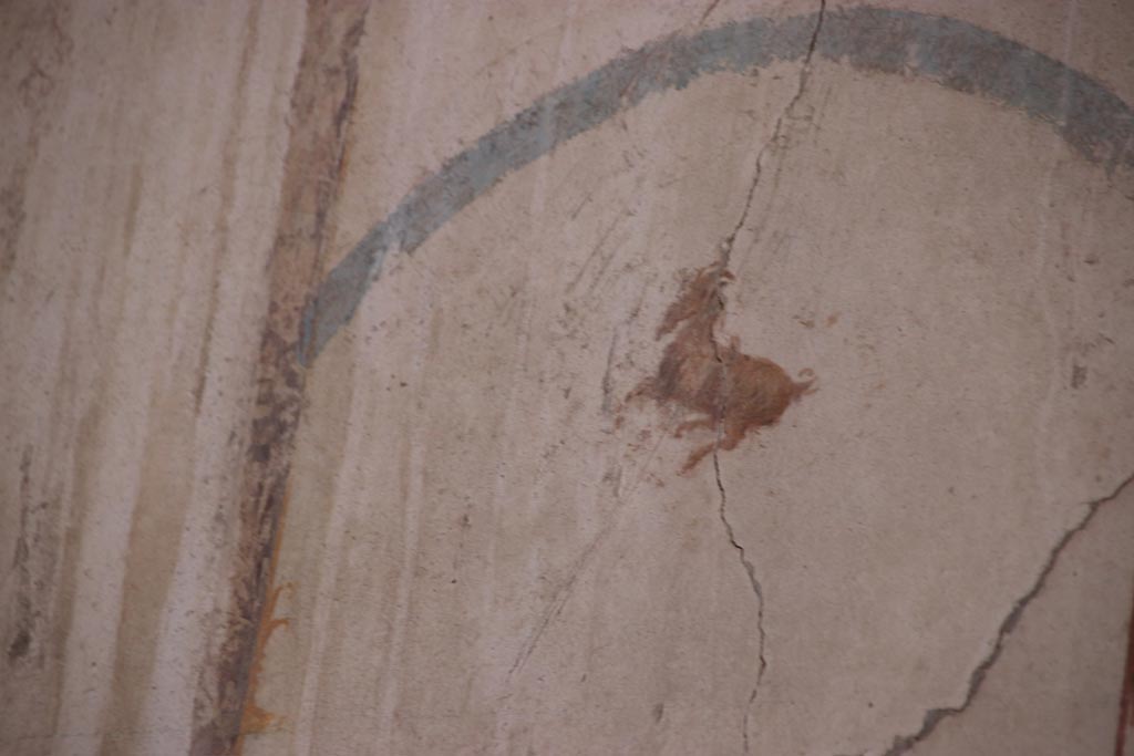 I.6.4 Pompeii. October 2022. Room 6, detail from upper south wall, centre right. Photo courtesy of Klaus Heese.