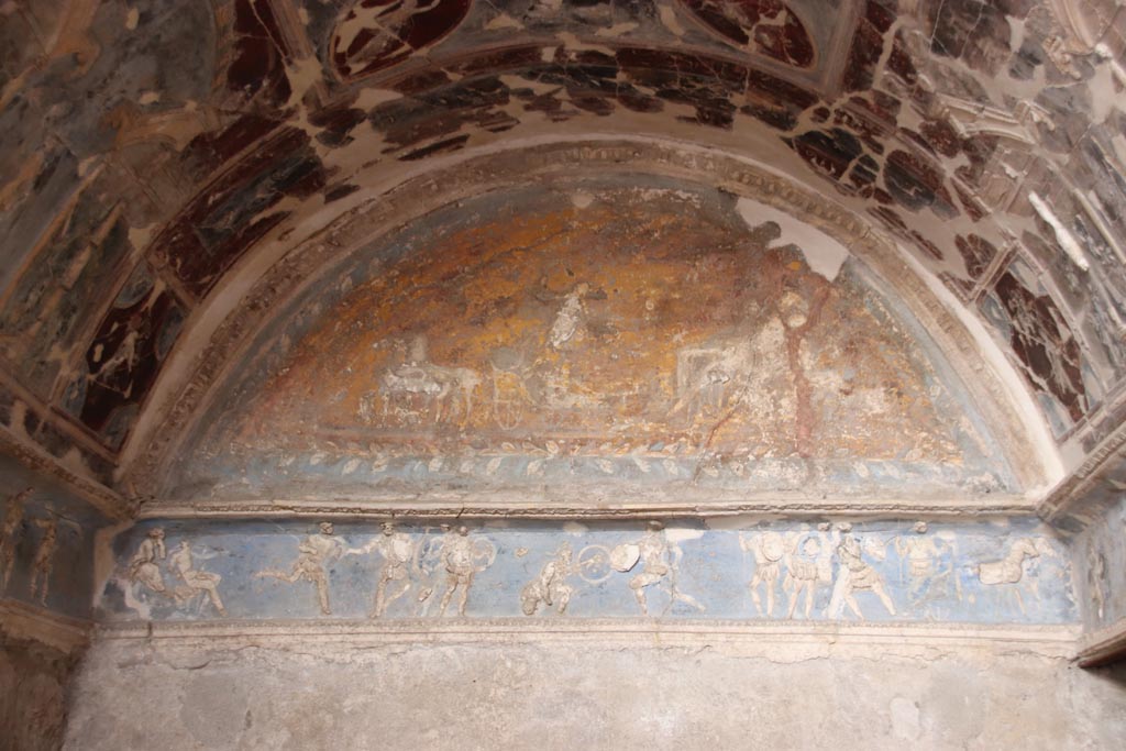 I.6.4 Pompeii. October 2022. Room 16, detail from sacellum showing Diana and Endymion in the lunette.
Photo courtesy of Klaus Heese.