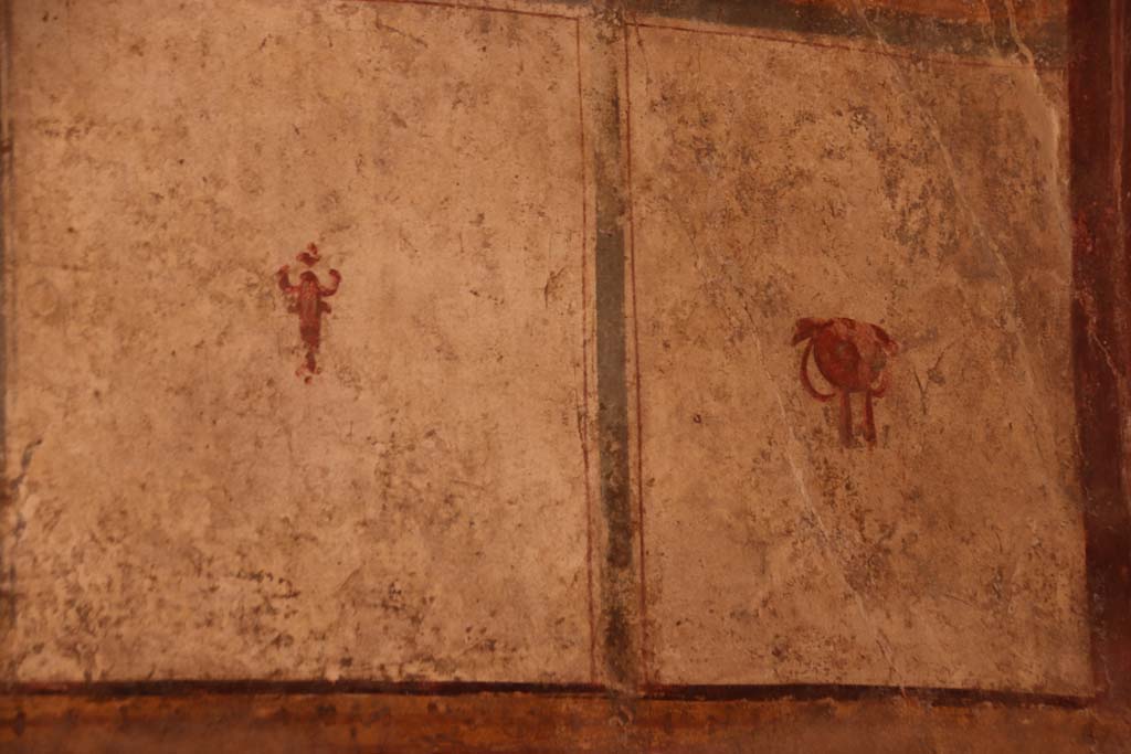 I.6.7 Pompeii. September 2019. Details of frescoes from north end of west wall. Photo courtesy of Klaus Heese.