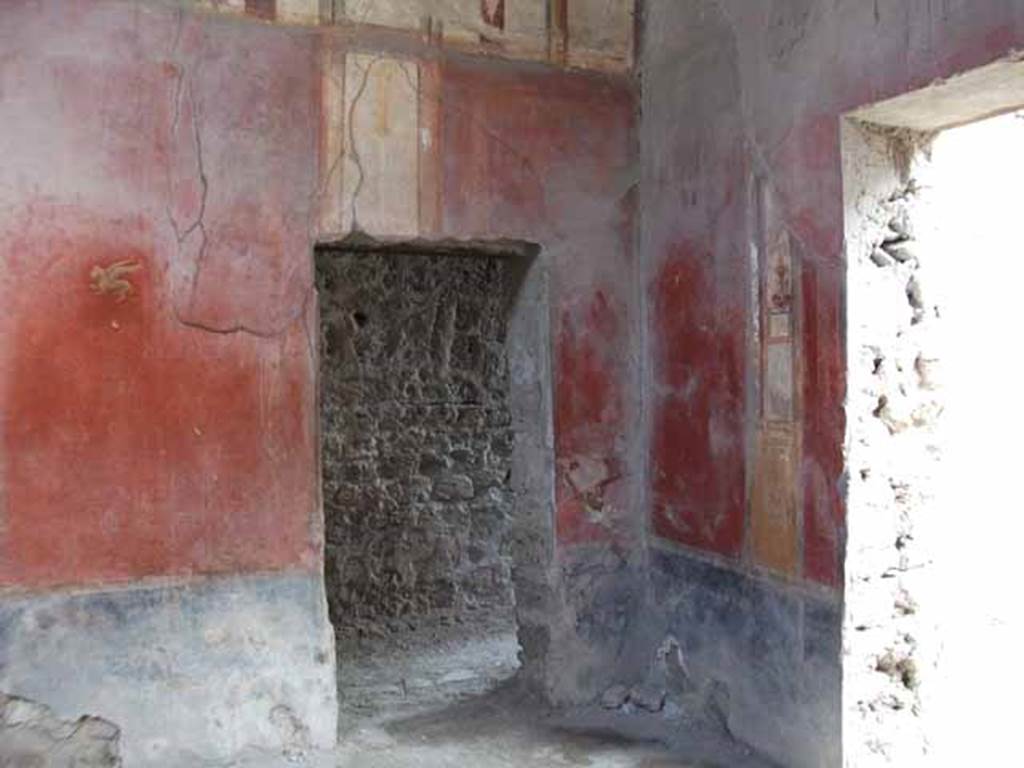 I.6.7 Pompeii. May 2010. South-east corner of atrium with doorway to corridor to rear.