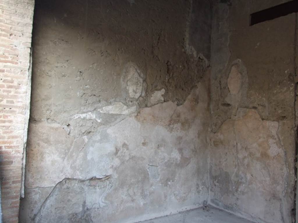 I.6.8 Pompeii. December 2007. East wall of shop.