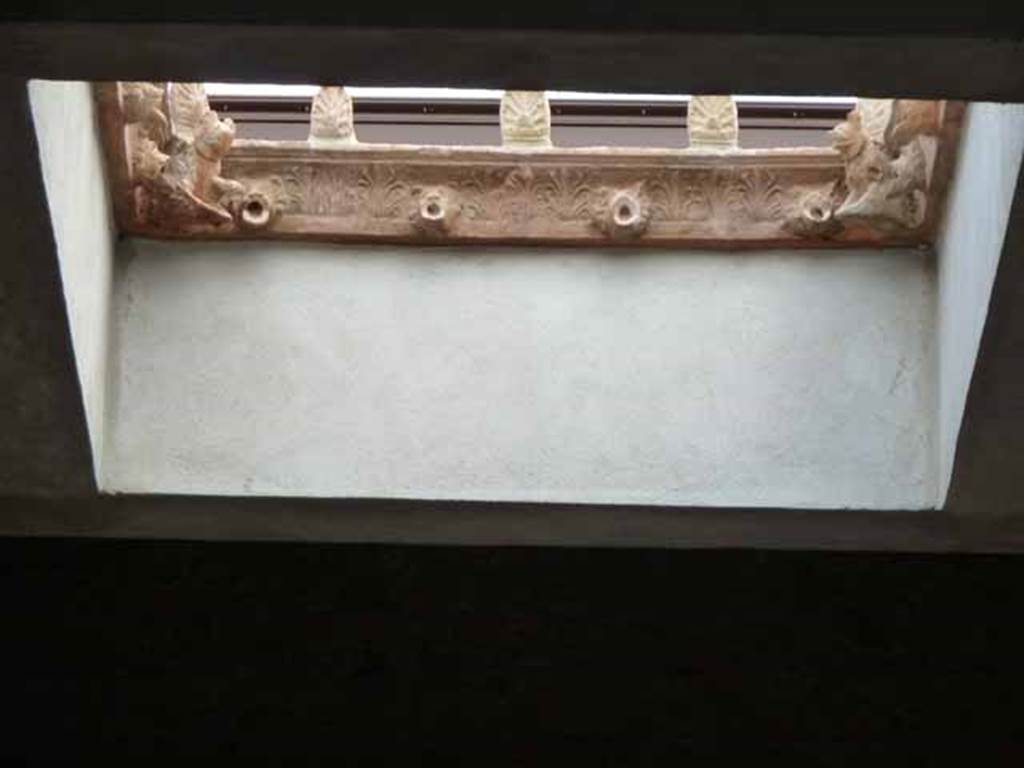 I.6.11 Pompeii. May 2010. Restored compluvium, and rainwater spouts.