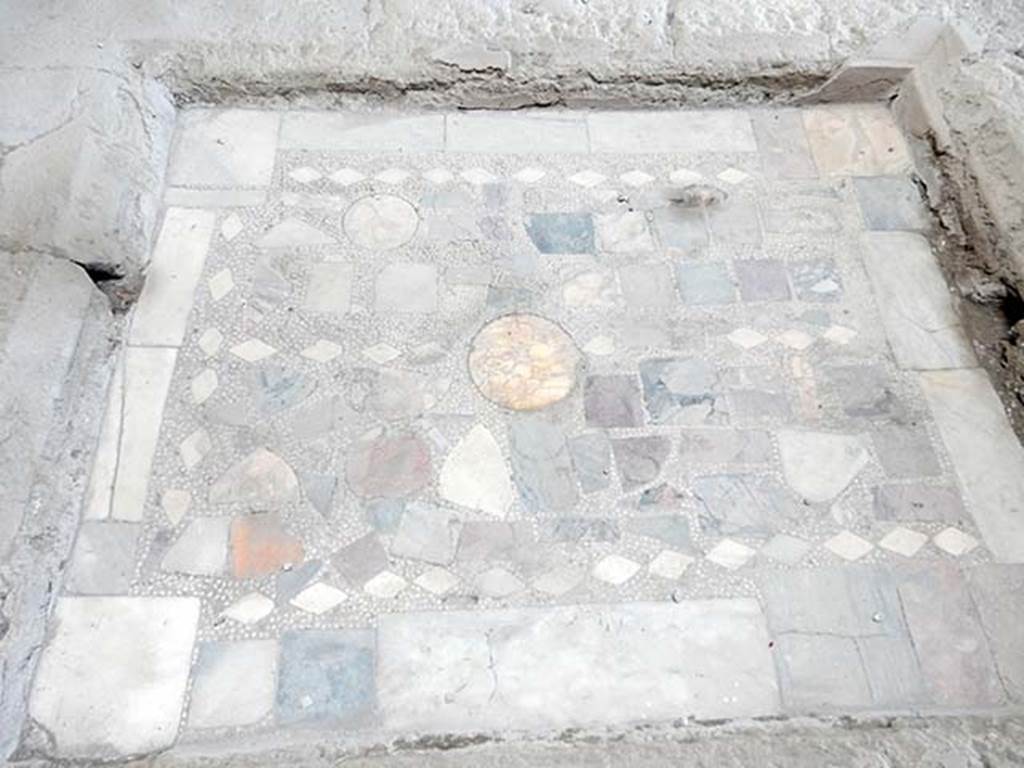 I.6.11 Pompeii. May 2017. Detail of coloured marble base of impluvium in atrium.
Photo courtesy of Buzz Ferebee.