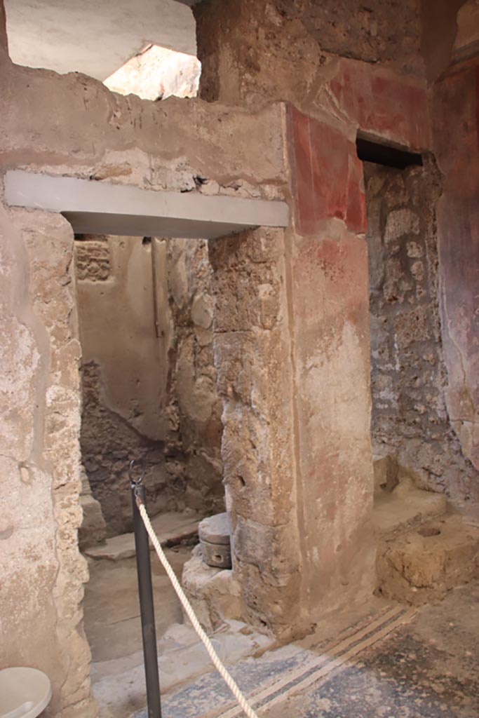 I.6.15 Pompeii. October 2023.
Room 1, looking south through doorway, with stairs to upper floor, on right. Photo courtesy of Klaus Heese.