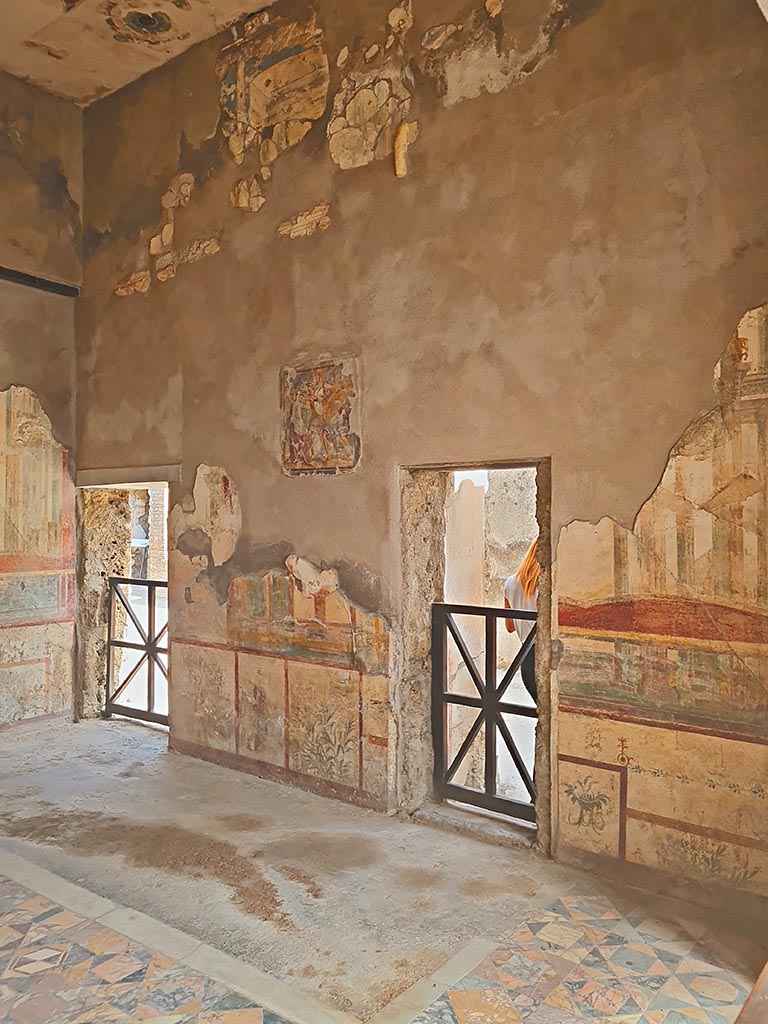 I.7.11 Pompeii. September 2024. Triclinium, looking towards east wall. Photo courtesy of Giuseppe Ciaramella.