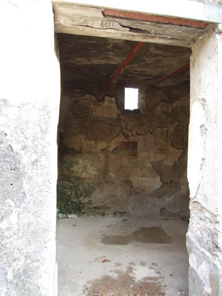 I.7.11 Pompeii. December 2006. Doorway to cubiculum on south side of blocked entrance I.7.10. Looking east.