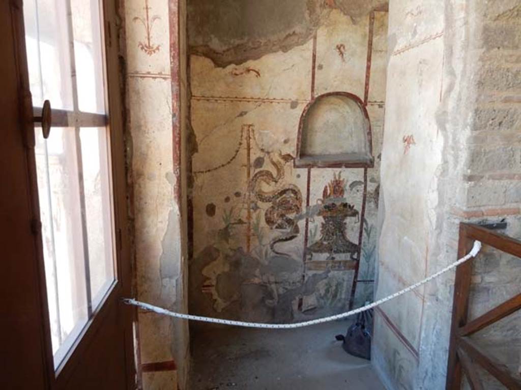 I.7.11 Pompeii. May 2017. Lararium on west wall. Photo courtesy of Buzz Ferebee.