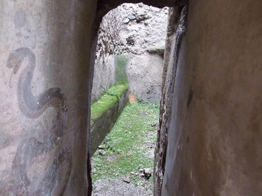 I.7.11 Pompeii. December 2006. Small room or cupboard on north side of lararium.