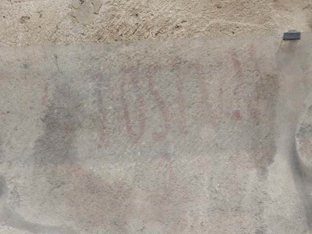 I.7.14 Pompeii. May 2017. Detail of part of the remains of the painted inscription � POSTVM   [CIL IV 7238].  Photo courtesy of Buzz Ferebee.
