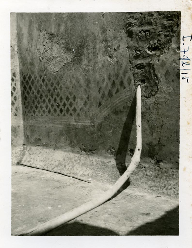 I.7.19 Pompeii but shown as I.7.12/15 on photo. Pre-1937-39. East wall of small garden area.
Remains of painted trellis and lead pipe, which by 1972 had been cut off flush with the wall.
Photo courtesy of American Academy in Rome, Photographic Archive. Warsher collection no. 1891.