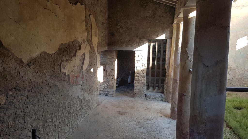 I.7.19 Pompeii. August 2023. Looking south along east portico of peristyle. Photo courtesy of Maribel Velasco.