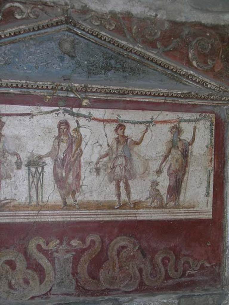 I.8.8 Pompeii. October 2004. Detail from lararium on south wall.  Photo courtesy of Nicolas Monteix.