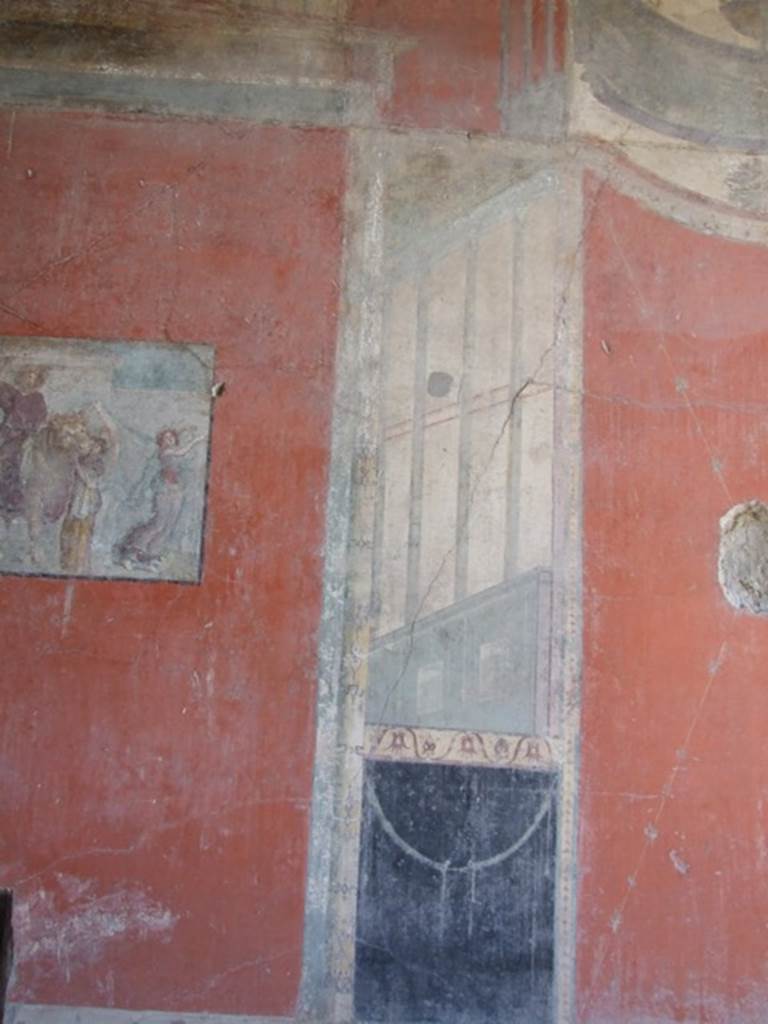 I.8.9 Pompeii. March 2009. Room 7. Triclinium. East wall. Lower level. Architectural painting at south side of central panel.