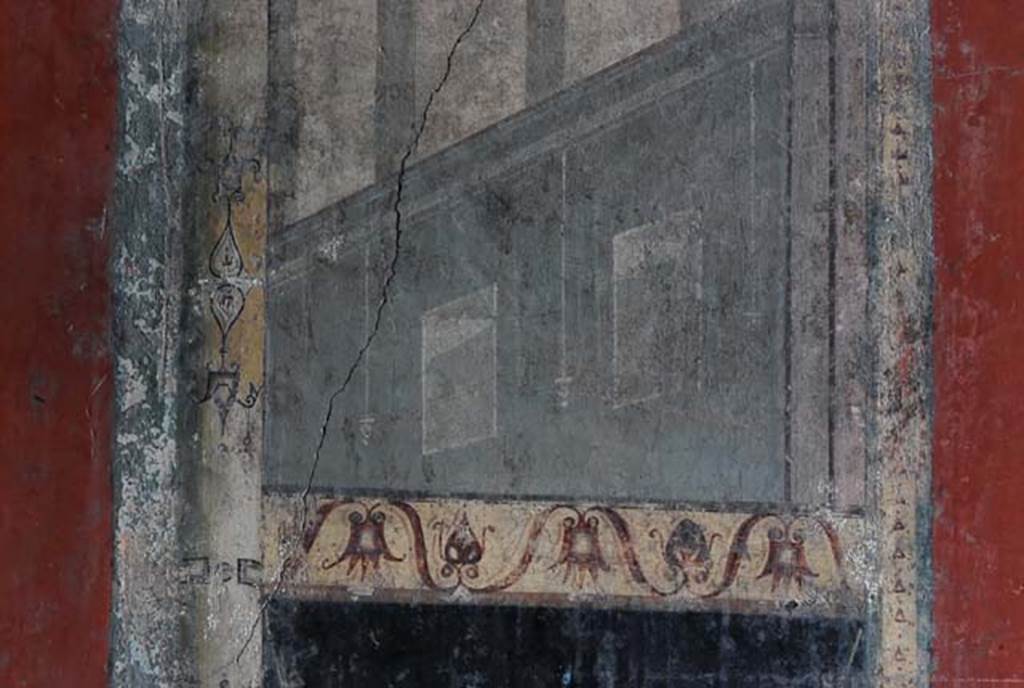 I.8.9 Pompeii. March 2008. Room 7, triclinium. Lower part of east wall. Detail of architectural painting at south side of central panel. Photo courtesy of Nicolas Monteix.