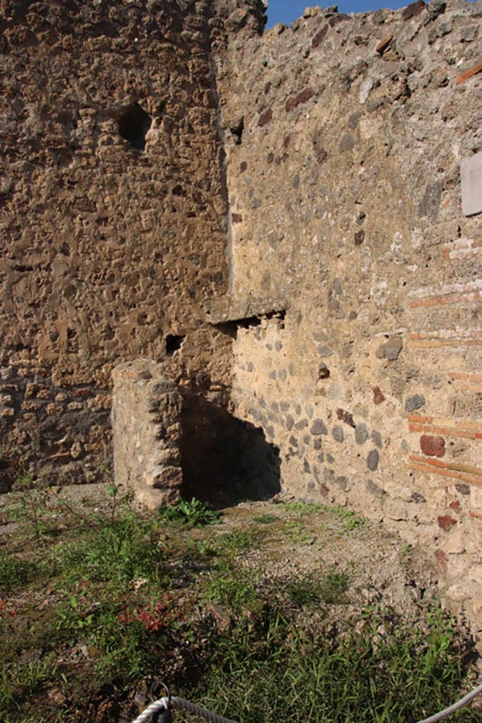 I.8.12 Pompeii. October 2022. 
Looking towards north-east corner with possible latrine ? Photo courtesy of Klaus Heese. 
