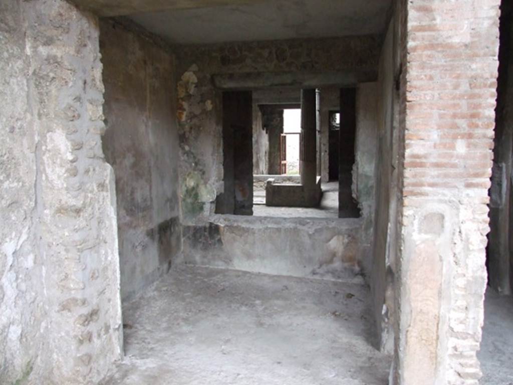 I.8.17 Pompeii. December 2007. Room 16. Room on south-west side of peristyle 17.
Looking west through to atrium 3.