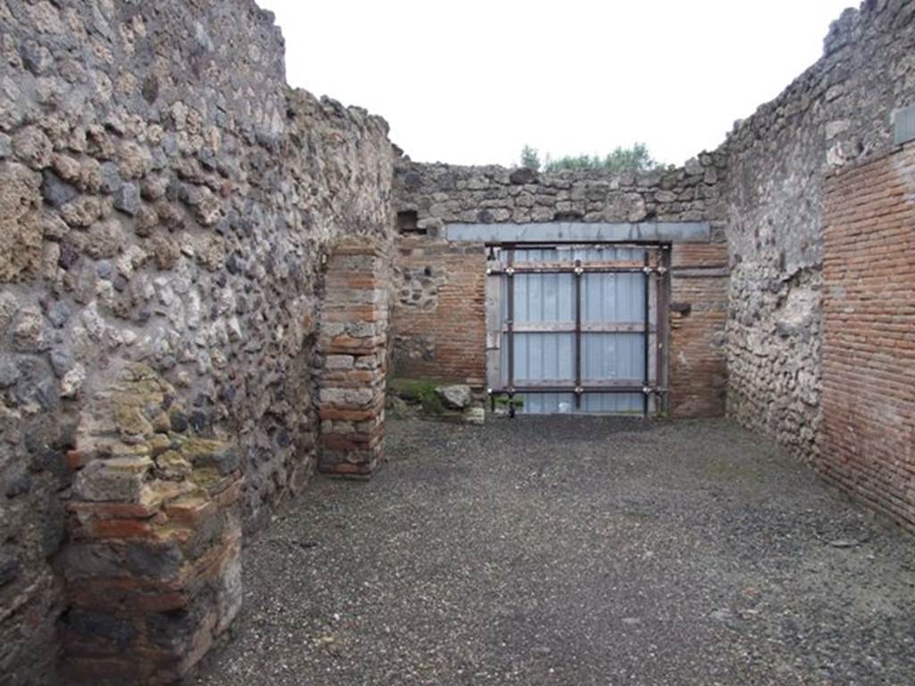I.8.17 Pompeii. December 2007. Looking east along north side of peristyle 17 to rear entrance at I.8.11.