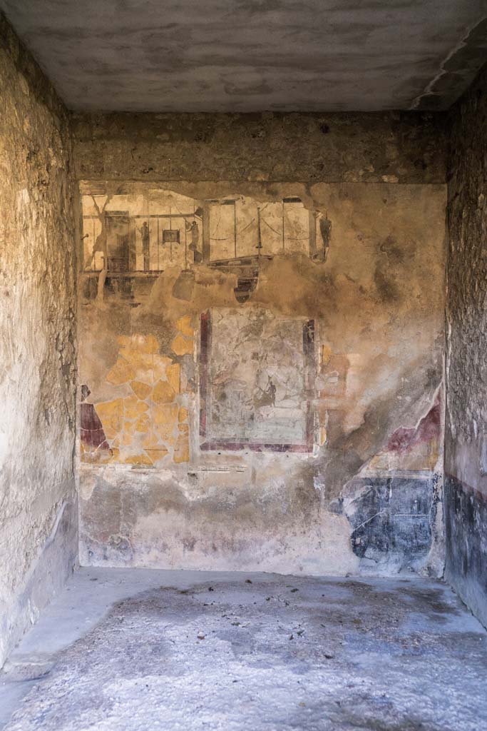 I.8.17 Pompeii. December 2021.
Room 18, looking towards west wall with central painting of Pan and the nymphs.
Photo courtesy of Johannes Eber.