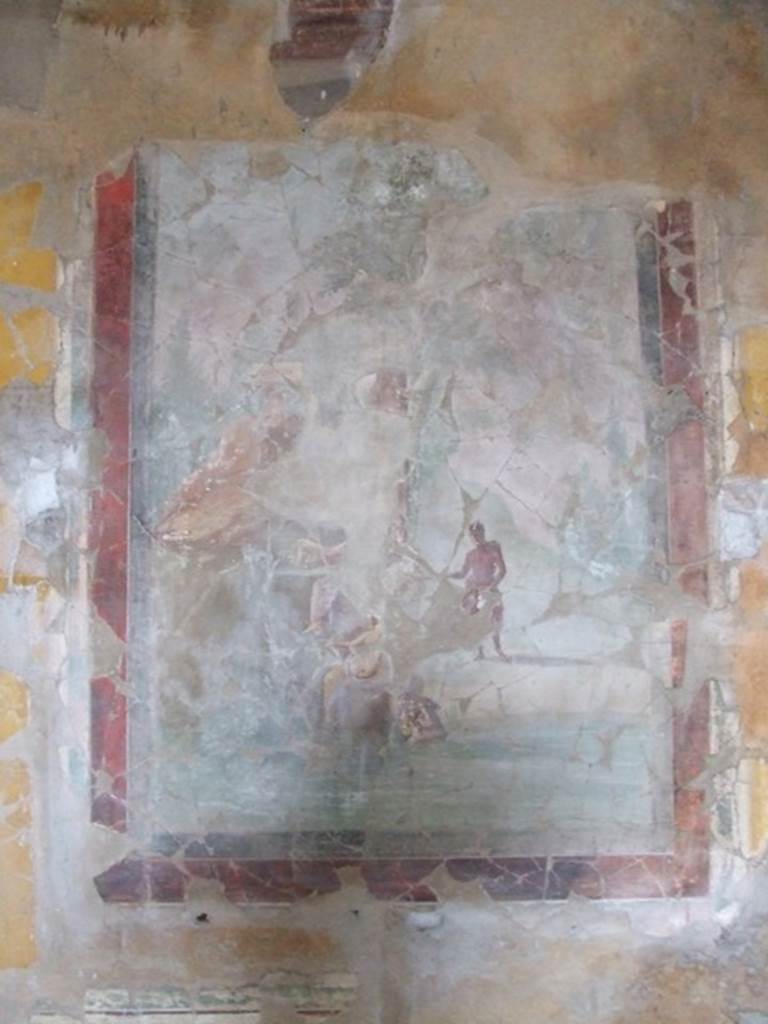 I.8.17 Pompeii. December 2007. Room 18, west wall, centre.
Wall painting of Pan and the nymphs. According to Peters, this painting was reassembled from fragments, and a few pieces in the centre are still missing. The foreground was a stretch of water, in the centre was a tree with a column, against the tree a votive tablet had been placed.
Left of centre was a rock, two nymphs were sitting against the rock. They each held a jug, from which water was pouring. Pan was standing on the flat ground to the right of centre. See Peters, W.J.T. (1963): Landscape in Romano-Campanian Mural Paintings.The Netherland, Van Gorcum & Comp. (p.89)