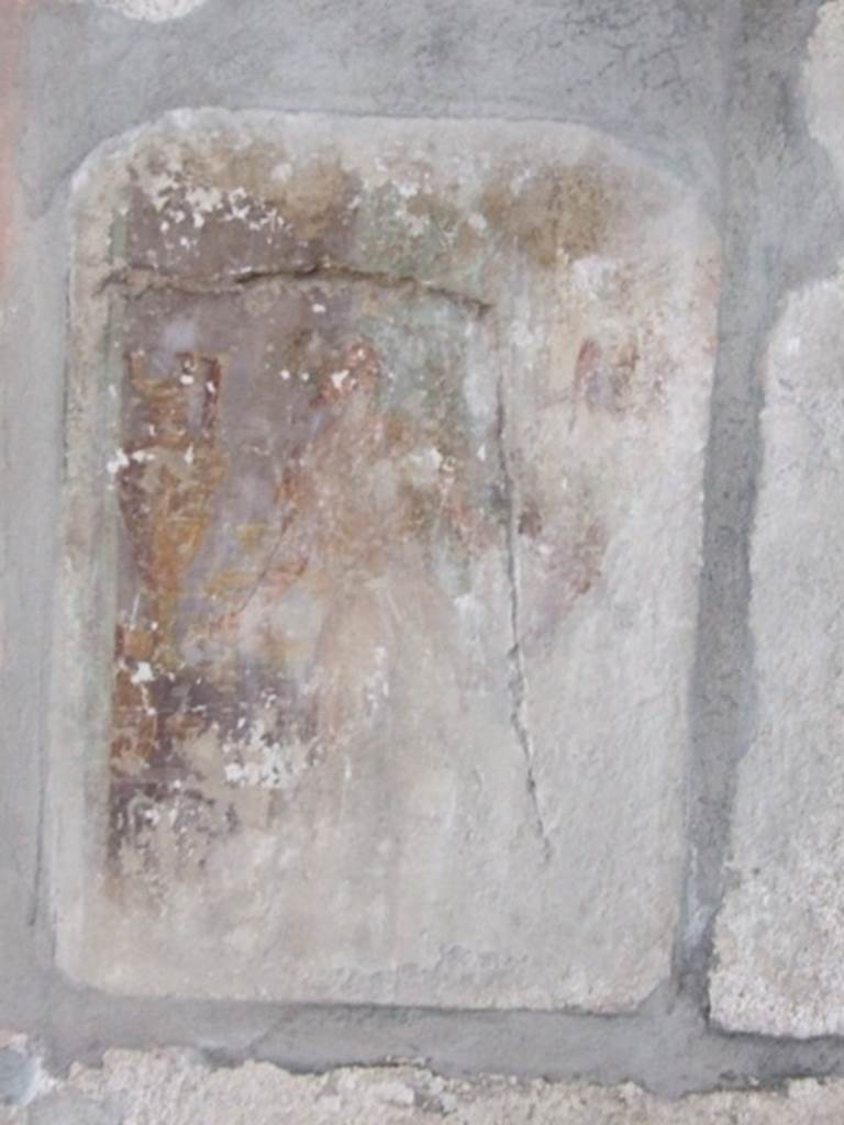 I.8.17 Pompeii. December 2007. Room 9, north wall. Remains of wall painting of pantomime? See Bragantini, de Vos, Badoni, 1981. Pitture e Pavimenti di Pompei, Parte 1. Rome: ICCD. (p.83). Richardson refers to a large picture in the tablinum that may represent Hercules freeing Theseus in the Underworld. See Richardson, L., 2000. A Catalog of Identifiable Figure Painters of Ancient Pompeii, Herculaneum. Baltimore: John Hopkins. (p. 74) According to Peters, this mythological painting had no landscape elements. See Peters, W.J.T. (1963): Landscape in Romano-Campanian Mural Paintings. The Netherlands, Van Gorcum & Comp. (p.105)