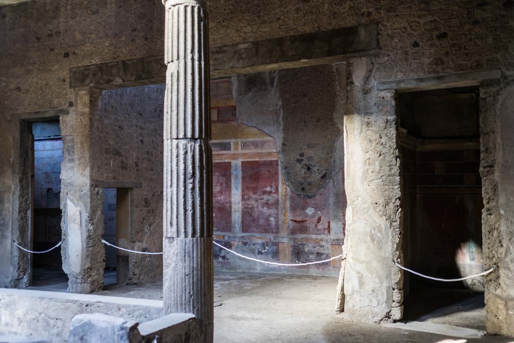 I.8.17 Pompeii. December 2021. 
Looking north-west across atrium 3 towards room 13, ala in centre of north side of atrium, with room 12, on right. Photo courtesy of Johannes Eber.


