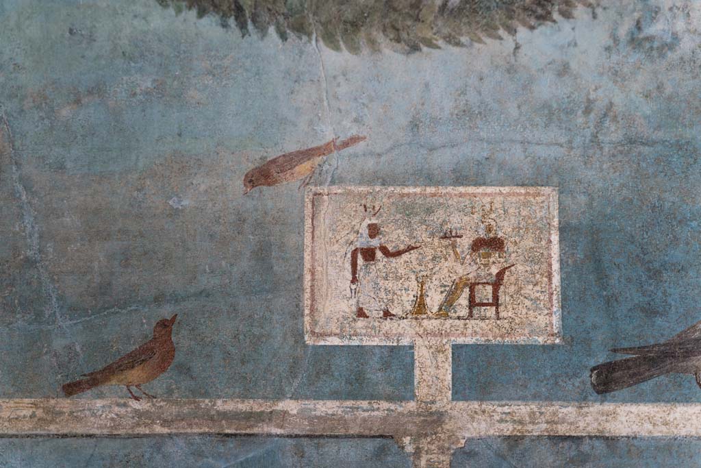 I.9.5 Pompeii. April 2022. Room 5, detail of painted decoration from north end of upper east wall. Photo courtesy of Johannes Eber.