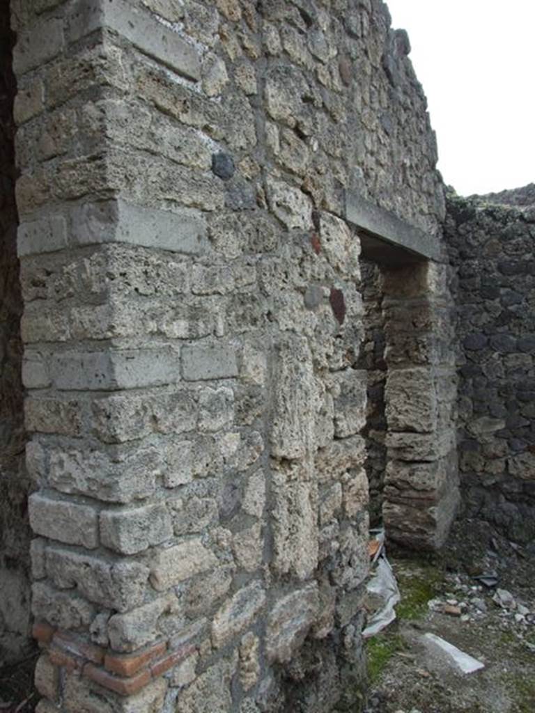 I.9.12 Pompeii. March 2009.  Room 4. Door to Cubiculum in south west corner of peristyle garden.