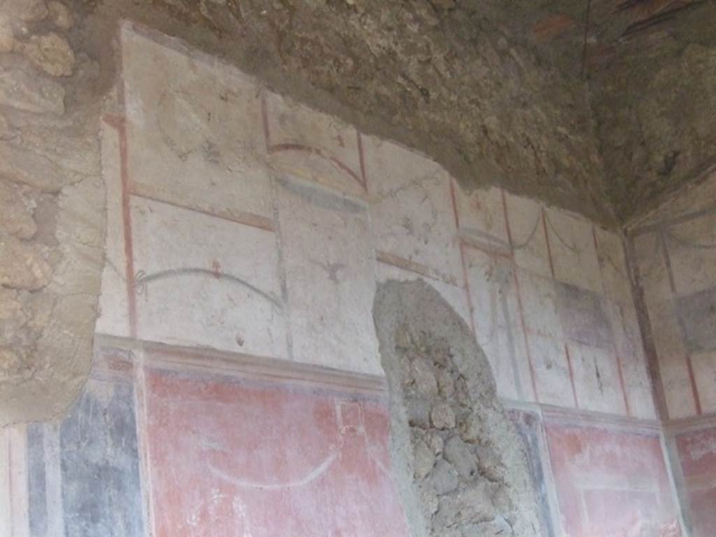 I.9.12 Pompeii. March 2009.  Room 6.  Painted decoration on upper North wall.