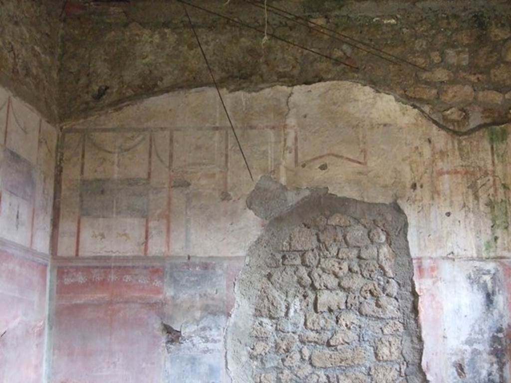I.9.12 Pompeii. March 2009.  Room 6. Painted decoration on upper East wall.