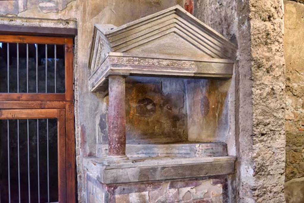 I.10.4 Pompeii. April 2018. Looking west in north-west corner of atrium towards side of aedicula lararium. Photo courtesy of Ian Lycett-King. Use is subject to Creative Commons Attribution-NonCommercial License v.4 International.