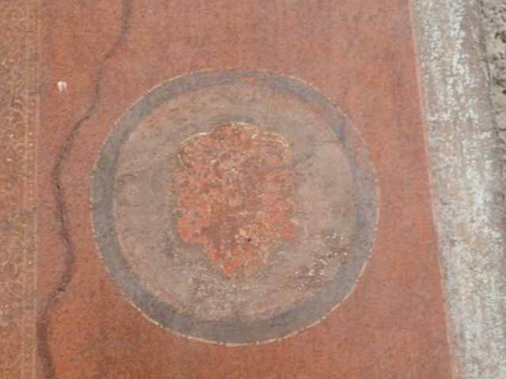 I.10.4 Pompeii. May 2010. West wall of atrium with faded painted medallion.
