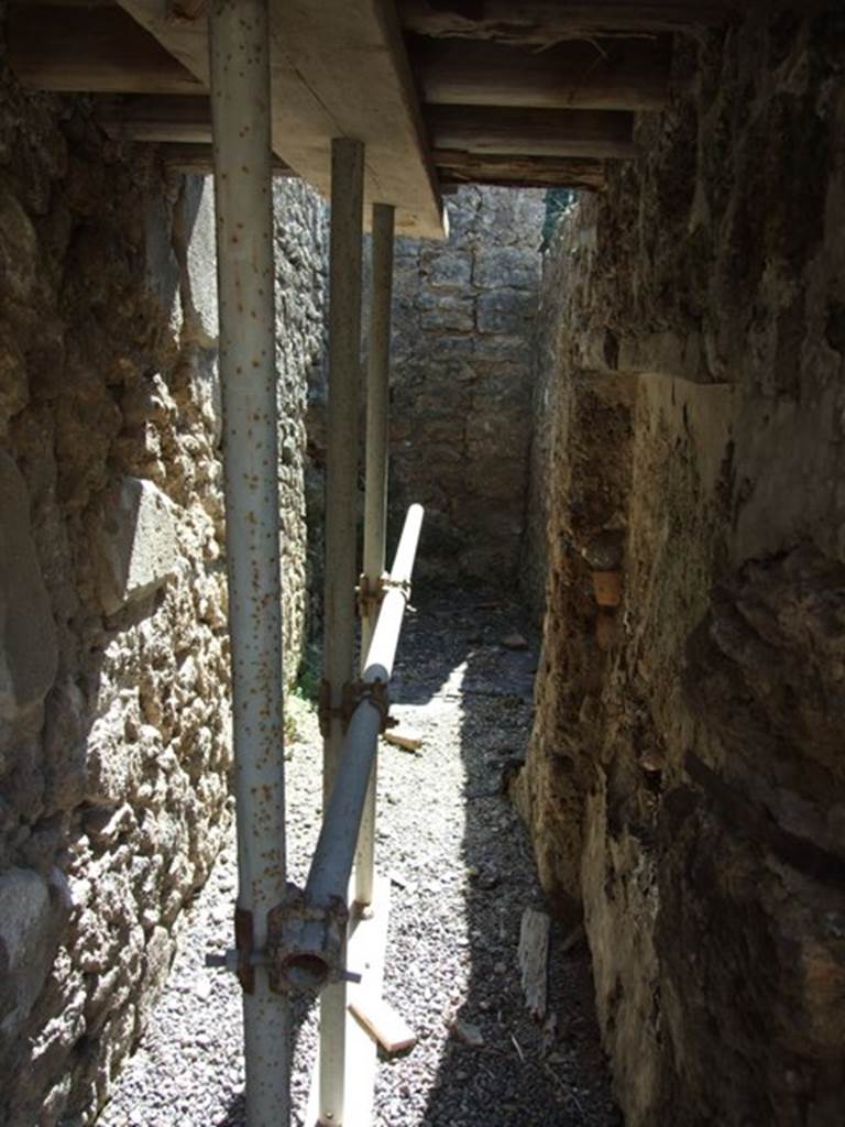 I.10.8 Pompeii. March 2009. Room 5 narrow area in south-east corner, looking south.