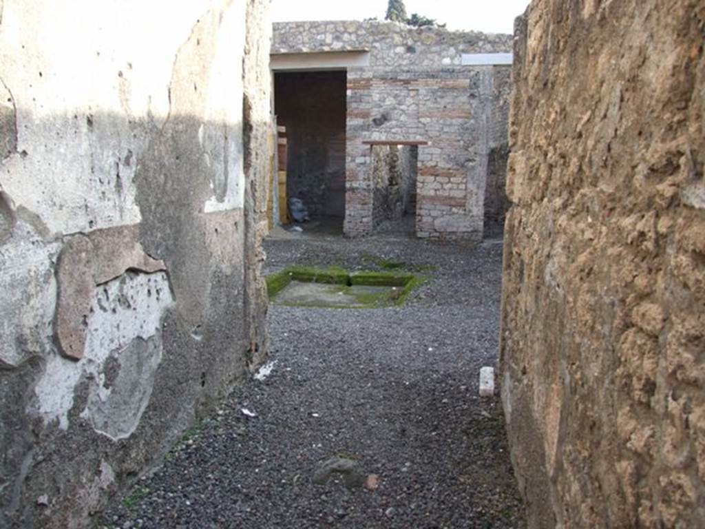 I.10.8 Pompeii. December 2007. Looking along fauces to atrium 1 and rear rooms 6, 7 and 8.
According to Wallace-Hadrill, this is possibly identified as a weaving establishment, on basis of loom weights and graffiti found.
A large range of domestic objects was also found here.
See Wallace-Hadrill, A. (1994). Houses and Society in Pompeii and Herculaneum. Princetown Univ. Press, (p.193)
For details of �finds� from this house,
See Allison, P.M. (2006). The Insula of the Menander at Pompeii: Vol. III The finds, Clarendon Press, Oxford, (p.214-230 & p.350-365).
See Online companion with list and photographs of finds from I.10.8

